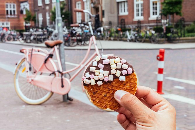 Amsterdam PRIVATE Bike Tour With Locals: Bike & Local Snack Included - Starting at Centraal Station: the ride begins fast
