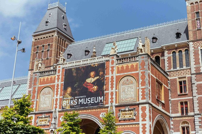 Amsterdam PRIVATE Bike Tour With Locals: Bike & Local Snack Included - Passing the Homomonument: history you feel in your body