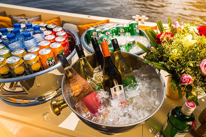 Amsterdam Private Boat Trip with Pizza and Unlimited Drinks - The 1.5-hour route feel: fast highlights, long views