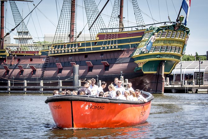Amsterdam Private Boat Trip With Skipper, Burger and Beers - Canal charm first: Red Light District area and classic canal houses