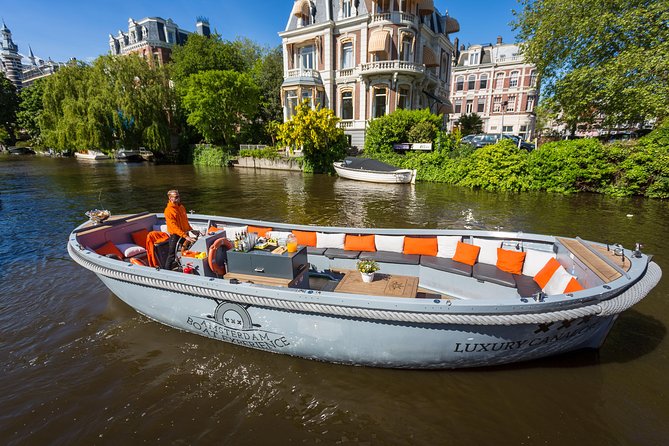Amsterdam Private Boat Trip With Skipper, Burger and Beers - Anne Frank House area: a sobering look with a different pace