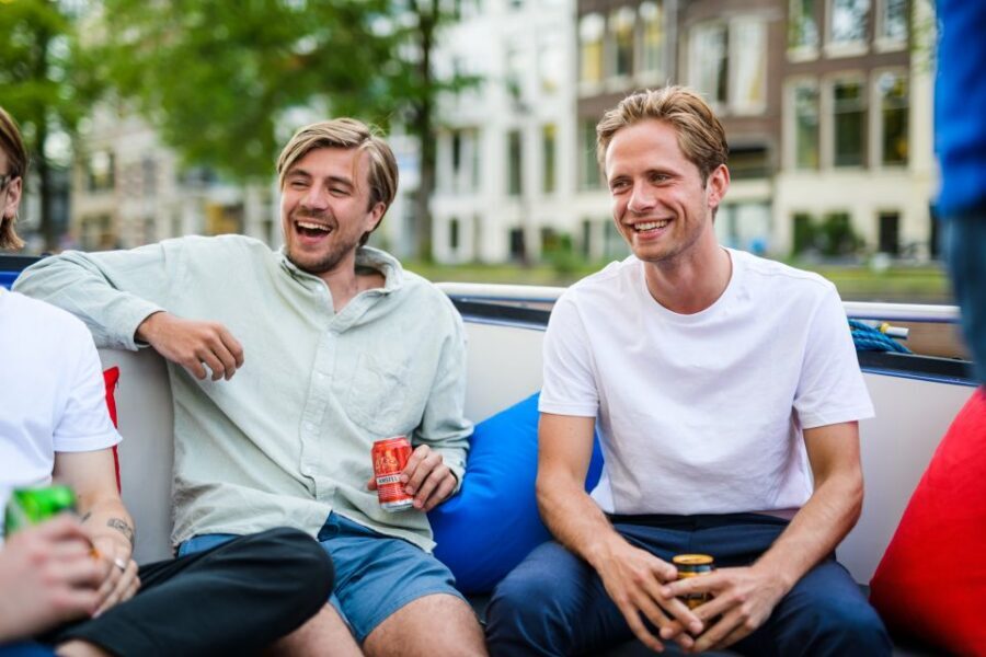 Amsterdam: Private Canal Booze Cruise with Unlimited Drinks - First leg: Amstel area, then the Red Light District (15 minutes)