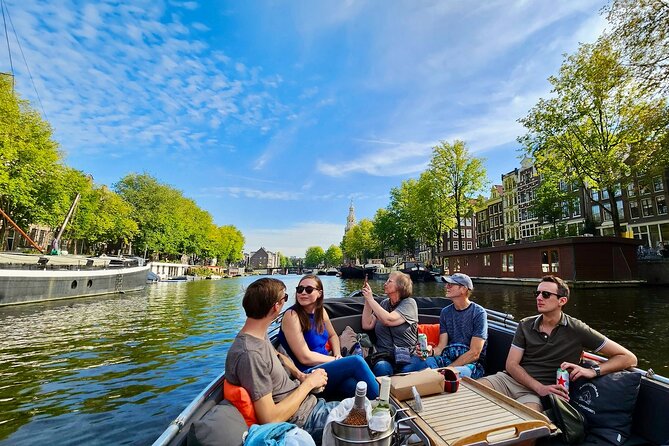 Amsterdam Private Canal Cruise – 90 Minutes through the Old City - Your guide and the pace: warm explanations, not a rush