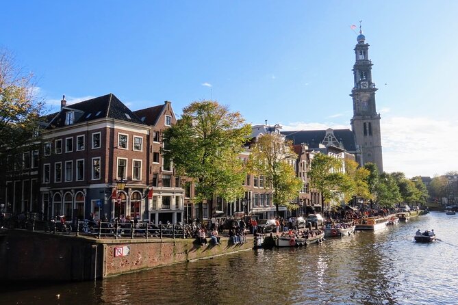 Amsterdam private city walking experience with a local - Dam Square and the Royal Palace: The Center of Formation and Conflict