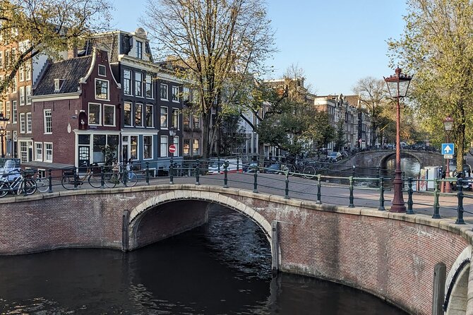 Amsterdam private city walking experience with a local - Nieuwmarkt: Waag, Guild Power, and the Dancing Houses