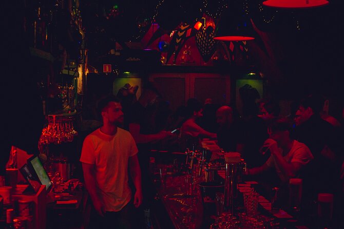 Amsterdam Private Pub Crawl in the City Center - Stop 1: Red Light District bar time with guided pacing