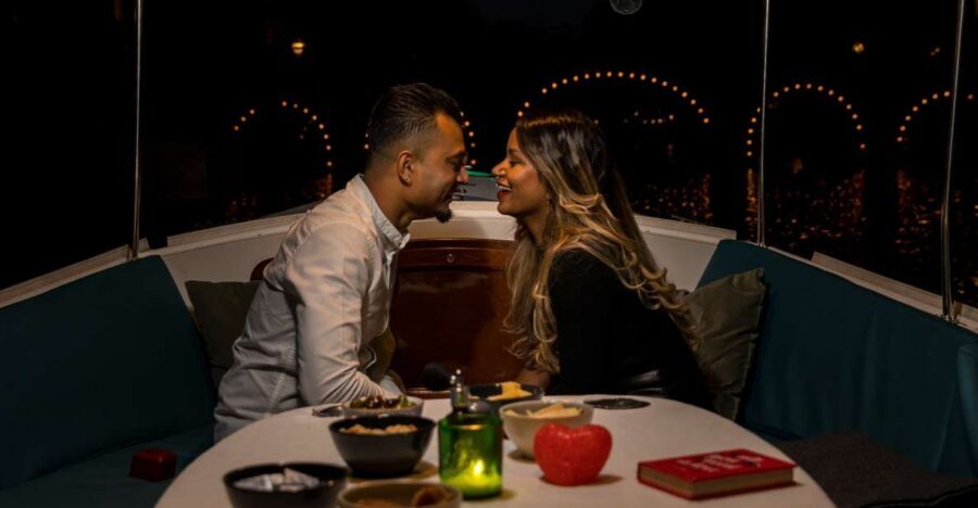 Amsterdam: Private Romantic Evening Boat Tour with Prosecco - The canal route after dark: a calm highlight loop