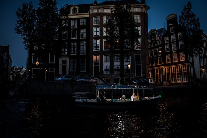 Amsterdam: Private Romantic Evening Canal Cruise + Bubbles/Snacks - Seven Bridges and the Skinny Bridge lights: the main show
