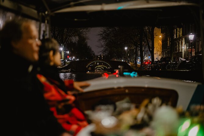 Amsterdam: Private Romantic Evening Canal Cruise + Bubbles/Snacks - Floating Flower Market at night: unusual, pretty, practical