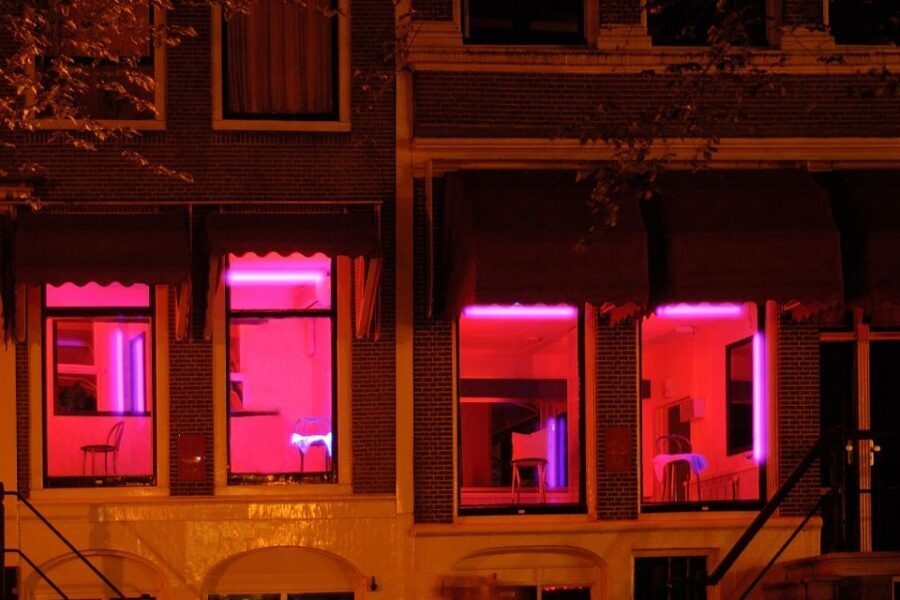 Amsterdam: Red Light District 1-hour Smartphone Audio Tour - Oude Kerk and the oldest bricks you’ll meet