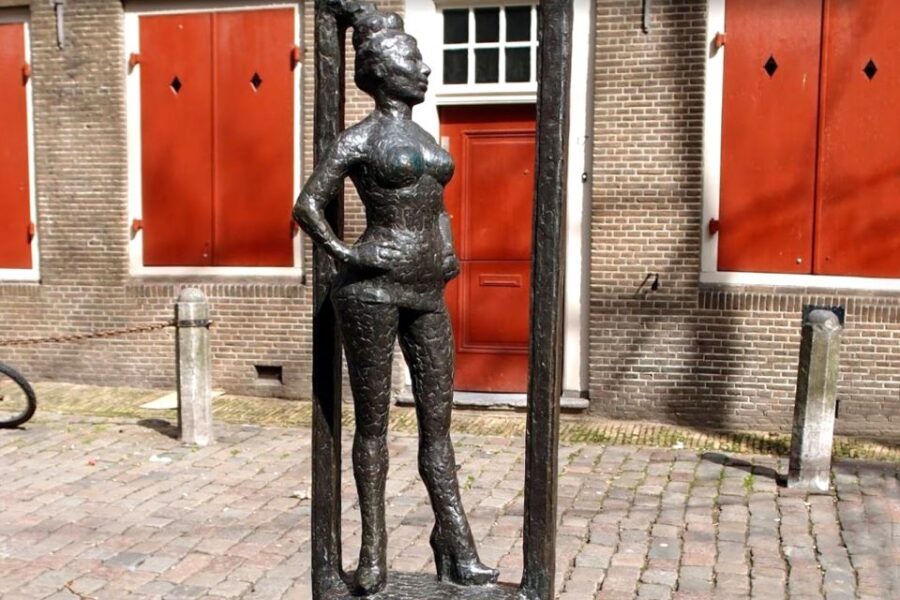 Amsterdam: Red Light District 1-hour Smartphone Audio Tour - Ending at Nieuwmarkt and the Waag building