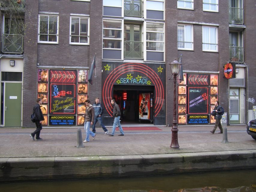 Amsterdam: Red Light District and Coffeeshop tour - Condomerie, Narrow Streets, and the Weird Stuff That Isn’t Random