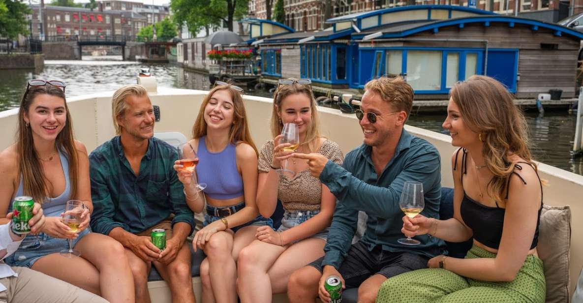 Amsterdam: Red-Light District Pub Crawl and Booze Boat Tour - Canal views with free-flowing drinks, then straight into the Red Light District