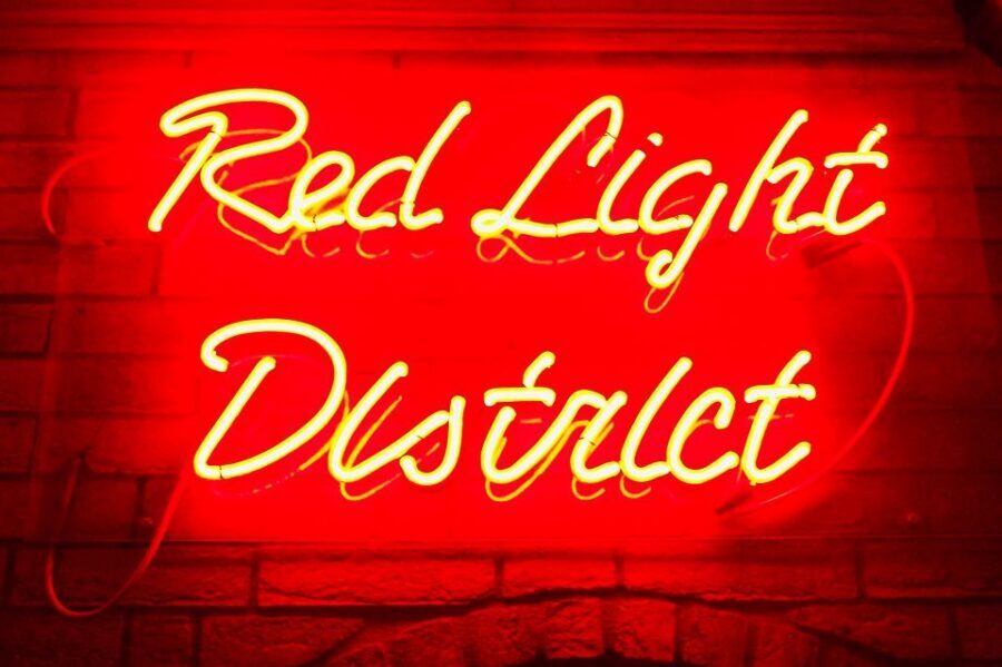 Amsterdam: Red Light District Walking Tour - Walking the Red Light District Like an Amsterdam Neighborhood