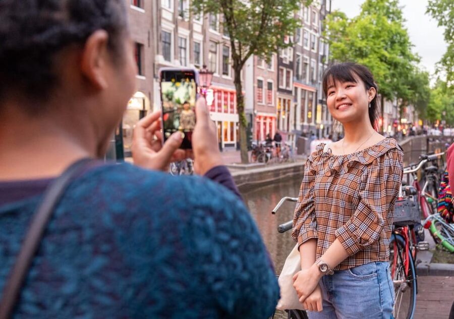 Amsterdam: Red Light Tour Exclusive + Peep Show - Condomerie and Oude Kerk: the neighborhood’s layers you can feel