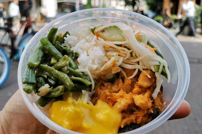 Amsterdam Self-Guided Food Tour in De Pijp Neighbourhood - Price and value: $11.11 for a plan, tastings, and discounts