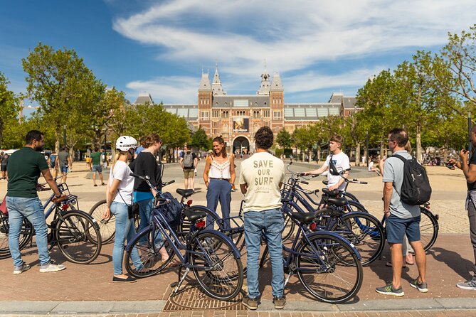 Amsterdam Small-Group Bike Tour With Canal Cruise, Drinks, Cheese - From Amsterdam Centraal to De Gooyer Windmill: Getting Oriented