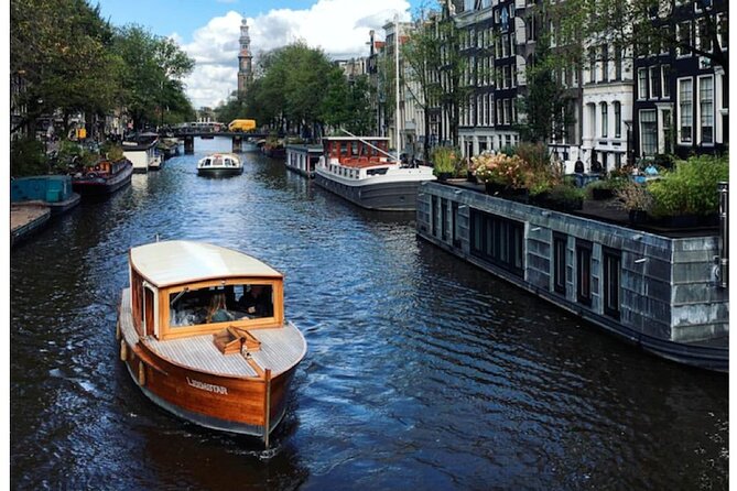 Amsterdam small-group canal cruise in 1920s saloon boat - Magere Brug: The Bridge Moment You’ll Want to Slow Down For