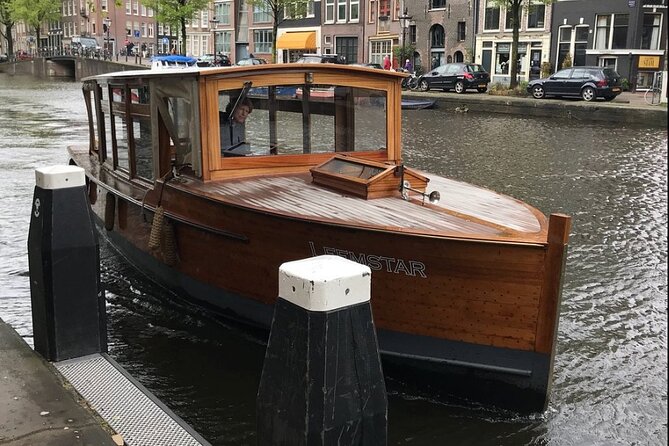 Amsterdam small-group canal cruise in 1920s saloon boat - Captain-Driven Stories Are the Real Upgrade