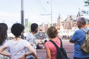 Amsterdam Small-Group Walking Tour - Dam Square and the city’s power story in 10 focused minutes
