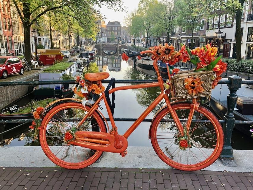 Amsterdam: Small Group Walking Tour with Fun Guide - Starting on Dam Square with a guide who keeps it human