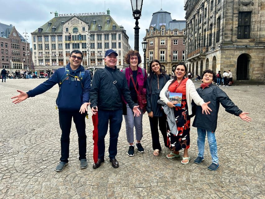 Amsterdam: Small Group Walking Tour with Fun Guide - Hidden gardens and quiet corners where photos feel effortless