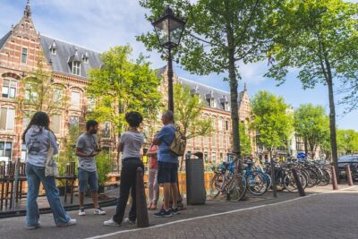 Amsterdam Small-Group Walking Tour with Typical Dutch Pancake - Zeedijk and Nieuwmarkt: Chinese Quarter sights plus a market-gate story