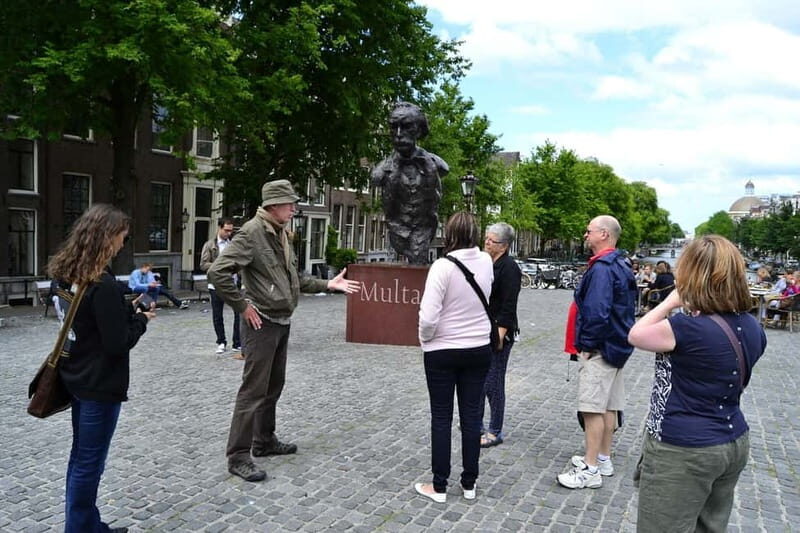 Amsterdam: The Story of History & Culture Walking Tour - Old Center and Beyond: Eastward Streets, Canal-Side Views, and Photo-Friendly Stops