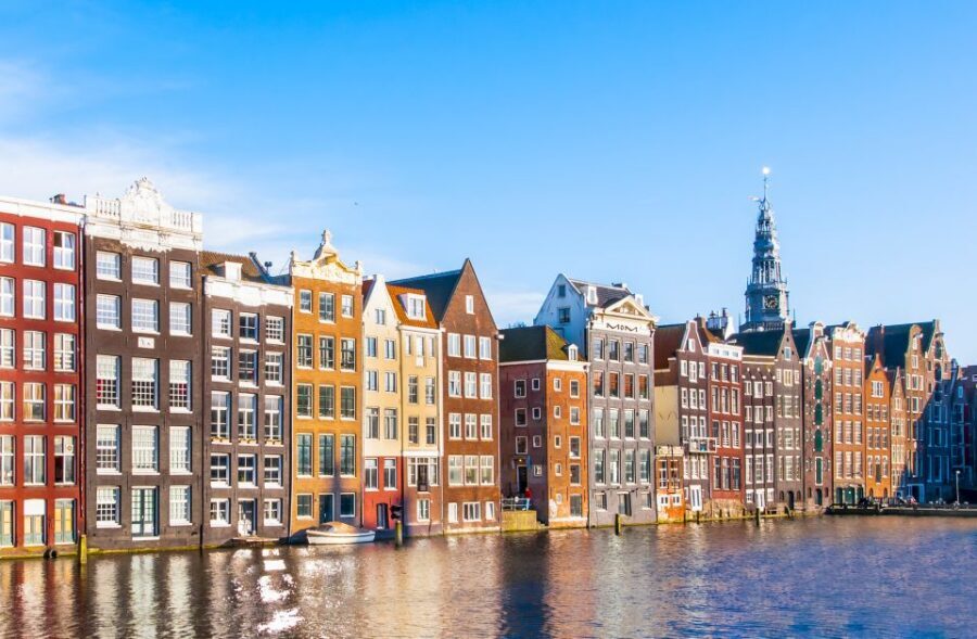Amsterdam Walking Tour and Canal Cruise - Street market stop: shop for snacks, not just souvenirs