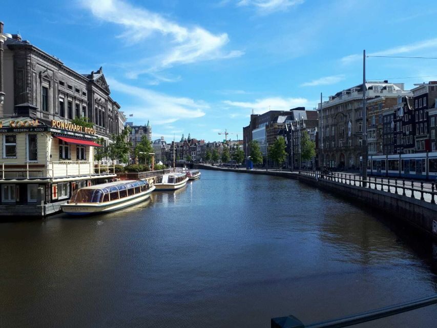 Amsterdam Walking Tour and Canal Cruise - What you’re paying for: value in a private guide + real transport