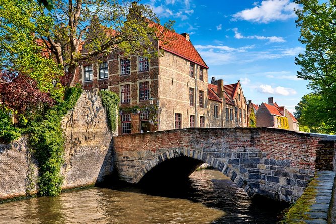 Bruges bus tour from Amsterdam - Gruuthusemuseum, St Bonifacius Bridge, and Rozenhoedkaai: power and legends in view