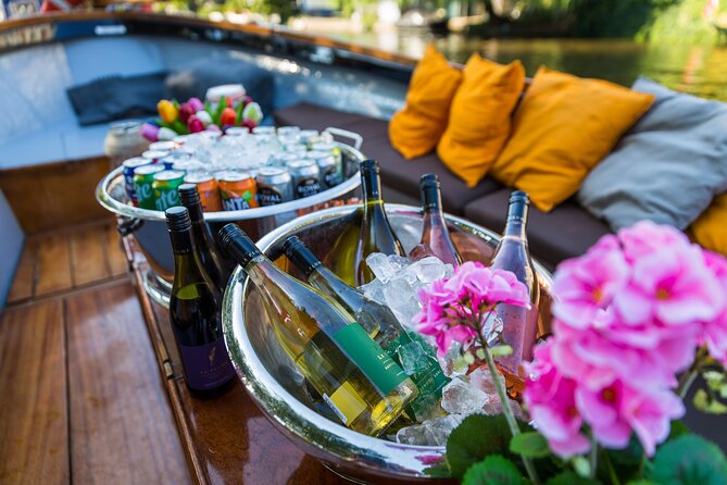 Classic Salonboat Tour in Amsterdam Including Cheese and Wine - Churches, opera, and big landmarks you pass without needing tickets