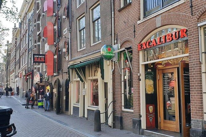 Exclusive small-group Amsterdam Red Light District tour - Old Town First: How De Wallen Fits Into Amsterdam’s Core