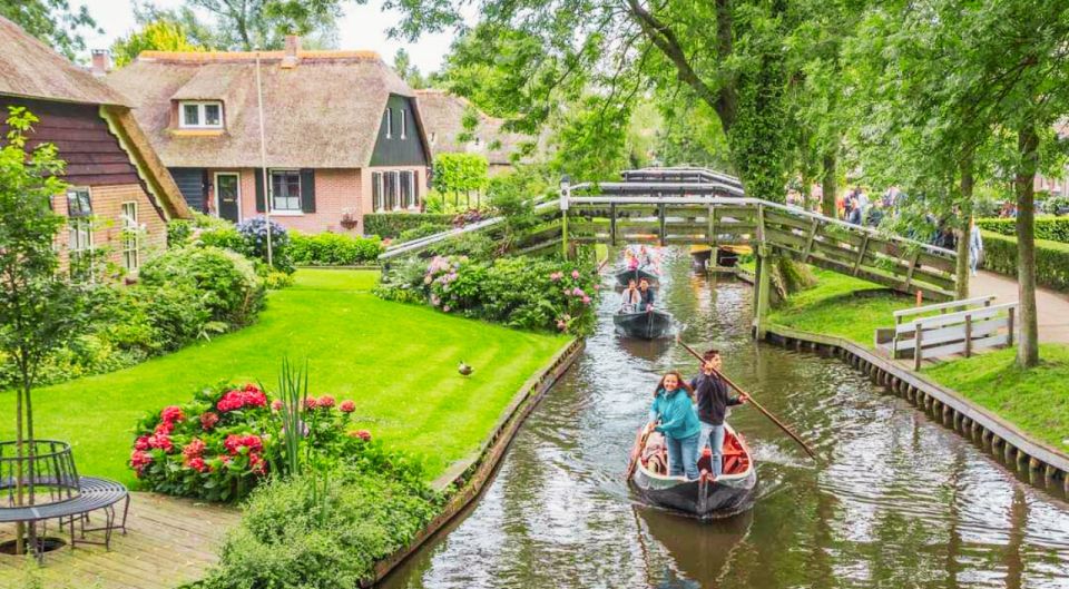 From Amsterdam: Giethoorn Guided Day Trip with Canal Cruise - Walking Giethoorn with a local guide: small village, big storytelling