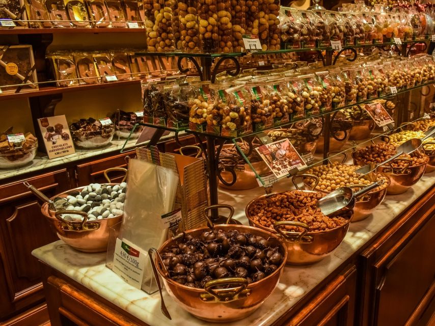 From Amsterdam: Private Sightseeing Tour to Brussels - The driver experience: safety, punctual pickup, and smart food tips