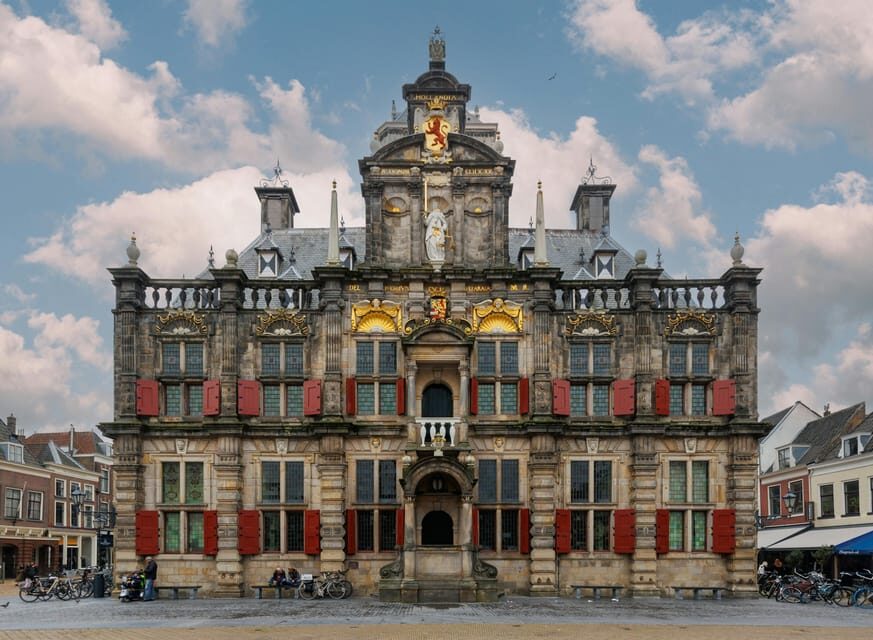 From Amsterdam: Rotterdam to The Hague and Delft - Starting at Prins Hendrikkade 59: meeting point and first-time logistics