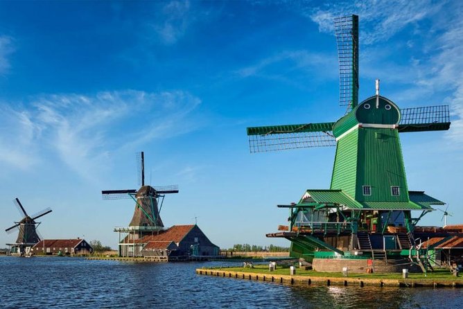 From Amsterdam: Zaanse Schans, Volendam, Giethoorn with Boat Tour - Zaanse Schans windmills, clogs, and cheese tasting: industrial Holland in miniature