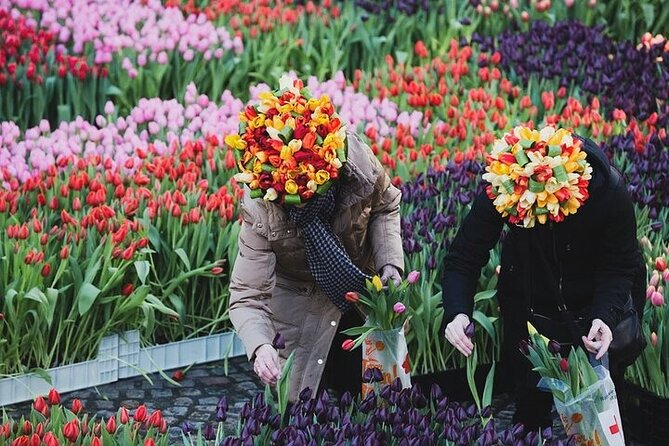 Full-Day Trip From Amsterdam to Keukenhof, Zaanse Schans + Cruise - Amsterdam canal cruise finish: Westerkerk, Anne Frank, and the UNESCO canal ring