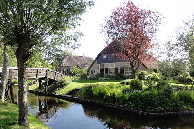 Giethoorn Day Trip from Amsterdam With Cruise and Cheeseplatter - The optional Amsterdam canal cruise voucher: flexibility after Giethoorn
