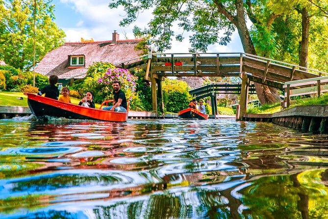 Giethoorn Private Tour & Boat Trip - Walking the Village: Bridges, Thatched Homes, Gardens, and Canal Views