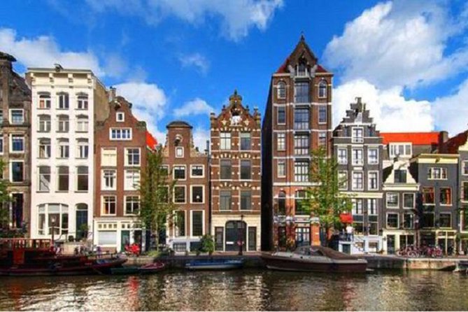 Half-Day Tour of Red Light District and Jordaan District with Private Guide in Amsterdam - Begijnhof and the old Jewish quarter: quiet history breaks in plain sight