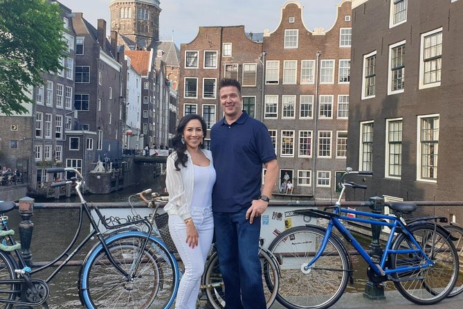Half-Day Tour of Red Light District and Jordaan District with Private Guide in Amsterdam - West Church finishes and Dam Square’s pull