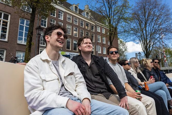 Highlights and Local Insights Canal Cruise Tour in Amsterdam - The neon Red Light District view, plus Oude Kerk nearby