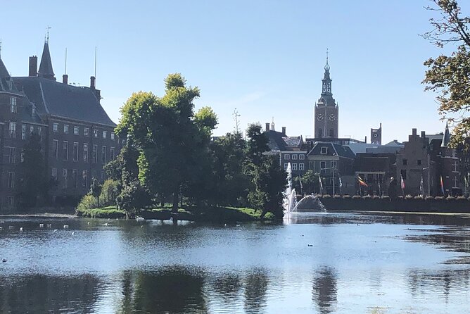Holland Four City Charm Tour - Private Day Tour - Delft’s canals and cobblestones: old-world charm with William of Orange