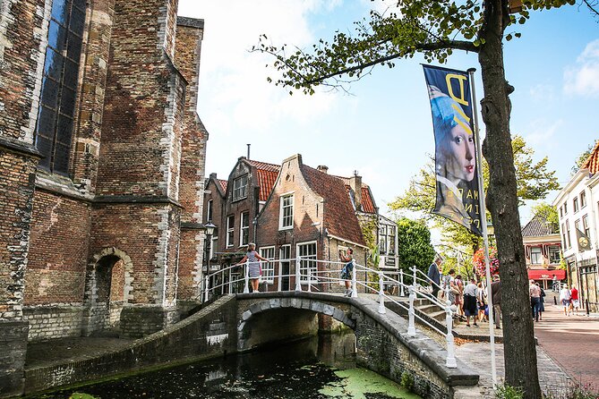Kinderdijk Windmills and Delft Small-Group Tour from Amsterdam - Comfort and pace: what to bring for an 8 to 9 hour day