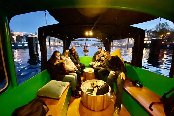 Light Event Amsterdam by small boat, 8 passengers max! You won't find any better - Your boat experience: heating, blankets, toilet, and a proper welcome
