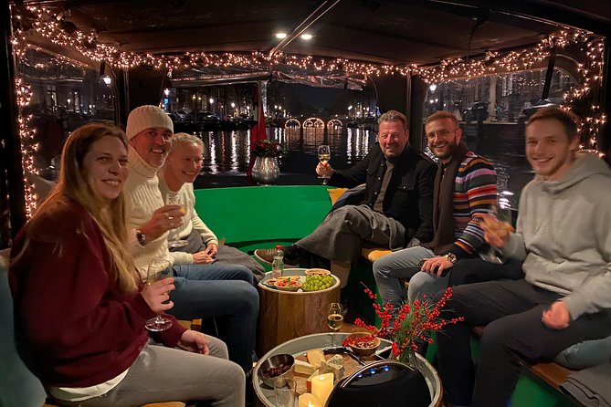 Light Event Amsterdam by small boat, 8 passengers max! You won't find any better - Meet-up spot: where to go before you board