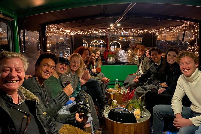 Light Event Amsterdam by small boat, 8 passengers max! You won't find any better - Drinks and snacks included: gluhwein, bitterballen, and cozy winter energy