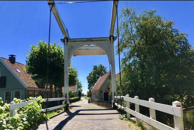 Off the beaten paths Dutch Country Side Private Tour in Jaguar - Volendam and Edam: fishing village charm to cheese-town identity