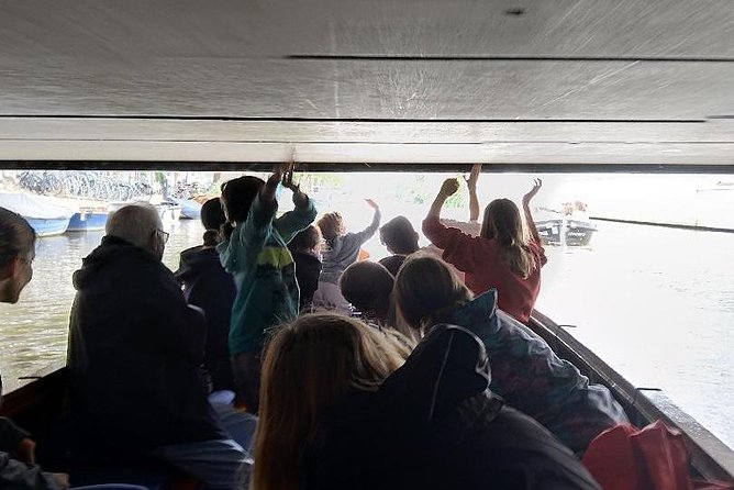 Open Dutch Boat! Silent electric drive. Nice cosy boat ride... - Practical Comfort Tips for a Windy Amsterdam Day